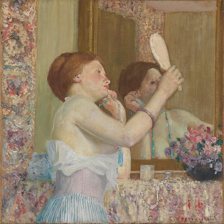 "Woman With A Mirror," by Frederick Carl Frieseke.