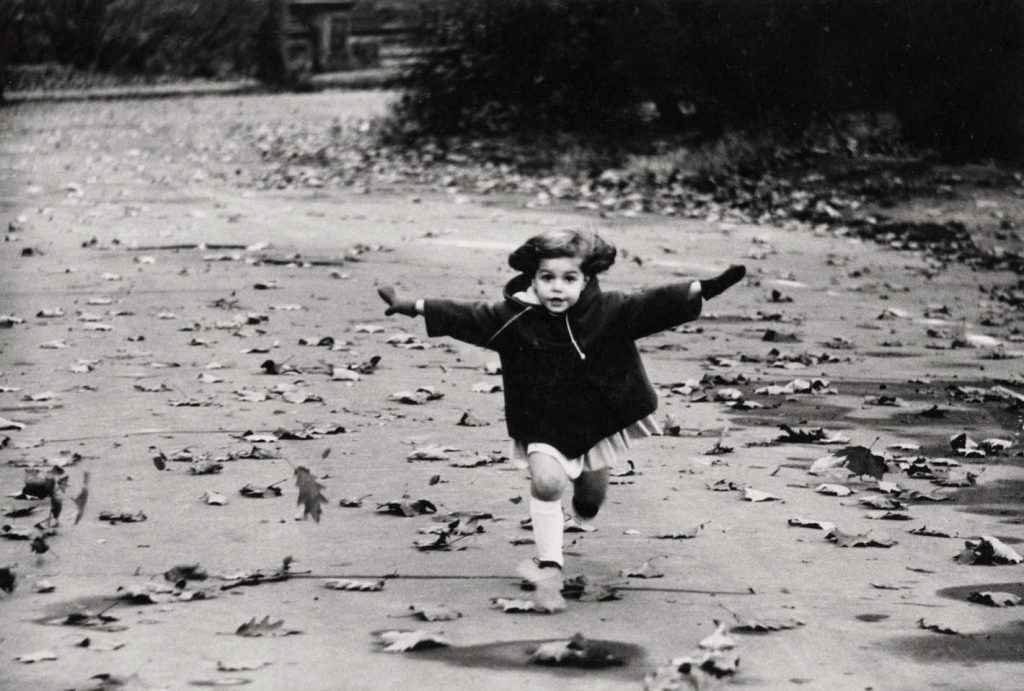 "Child Running In The Park, N.Y.C." by Diane Arbus.