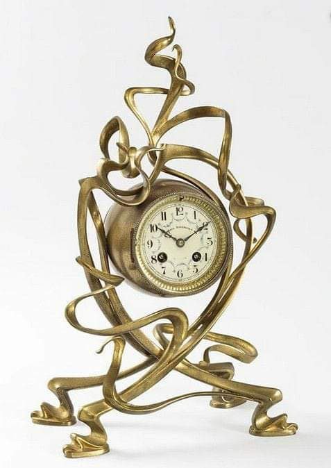 "Gilt Bronze Clock," by Victor Horta.