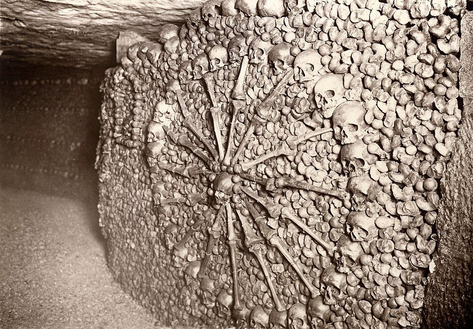 Bone sculpture in the Catacombs of Paris.
