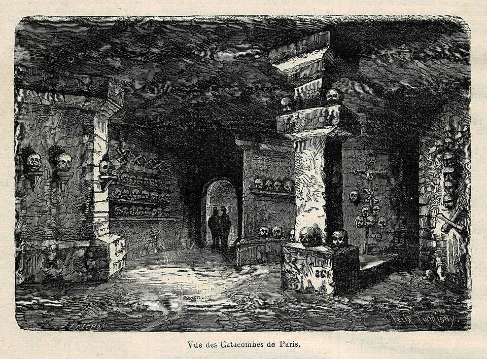 Illustration show a view of the Catacombs of Paris.
