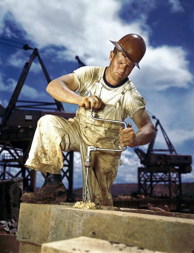 "Carpenter At Work On Douglas Dam," by Alfred T. Palmer.