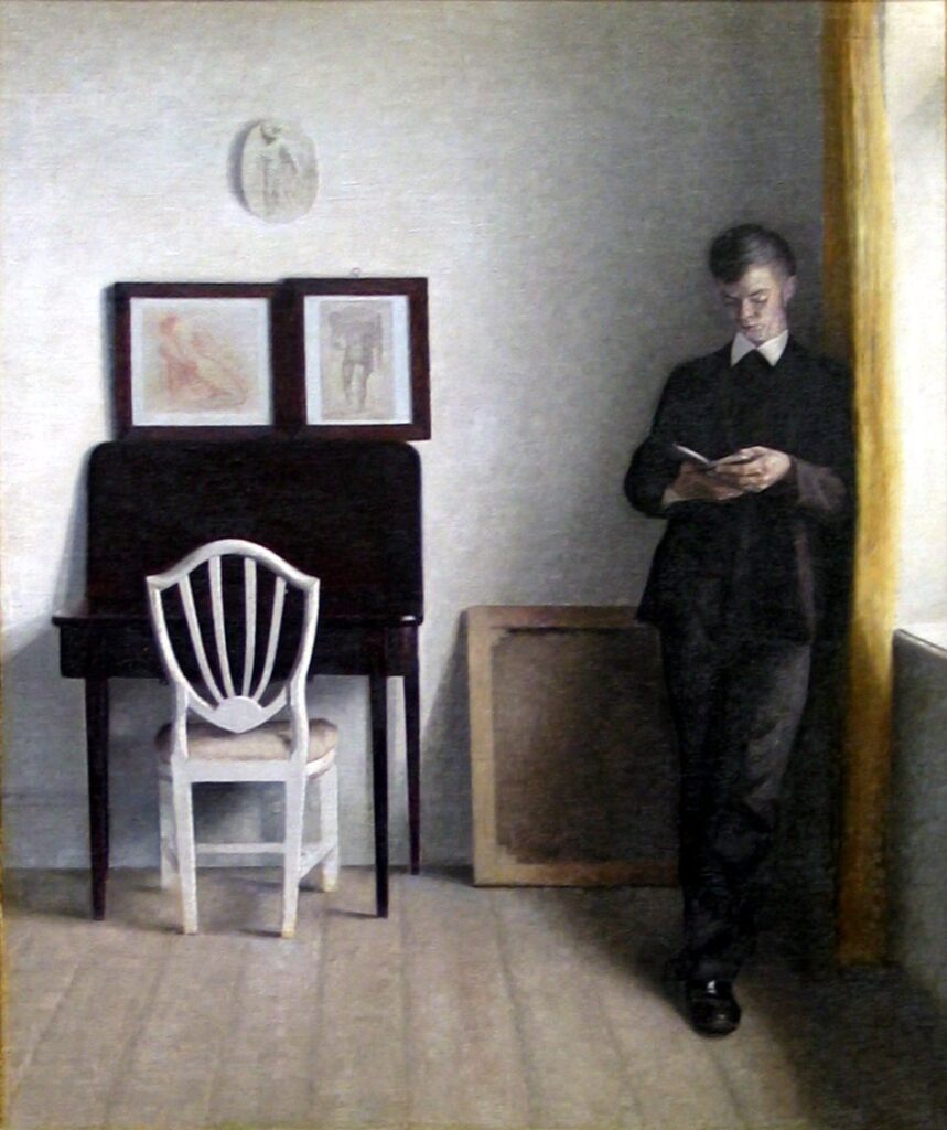 "Interiør Med Læsende Ung Mand," by Vilhelm Hammershoi.